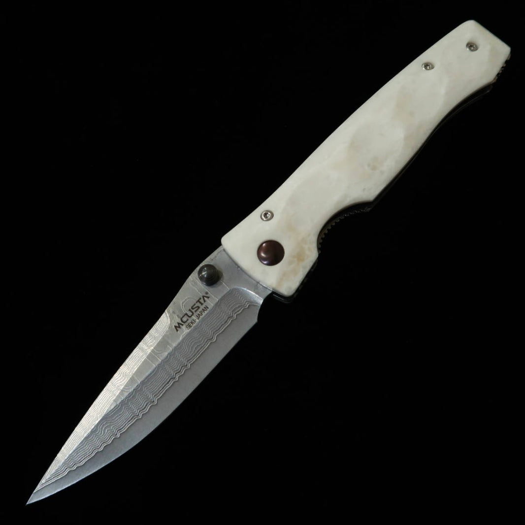 Navaja plegable MCUSTA ELITE Elite SPG2 Corian MC-0126D (94mm)