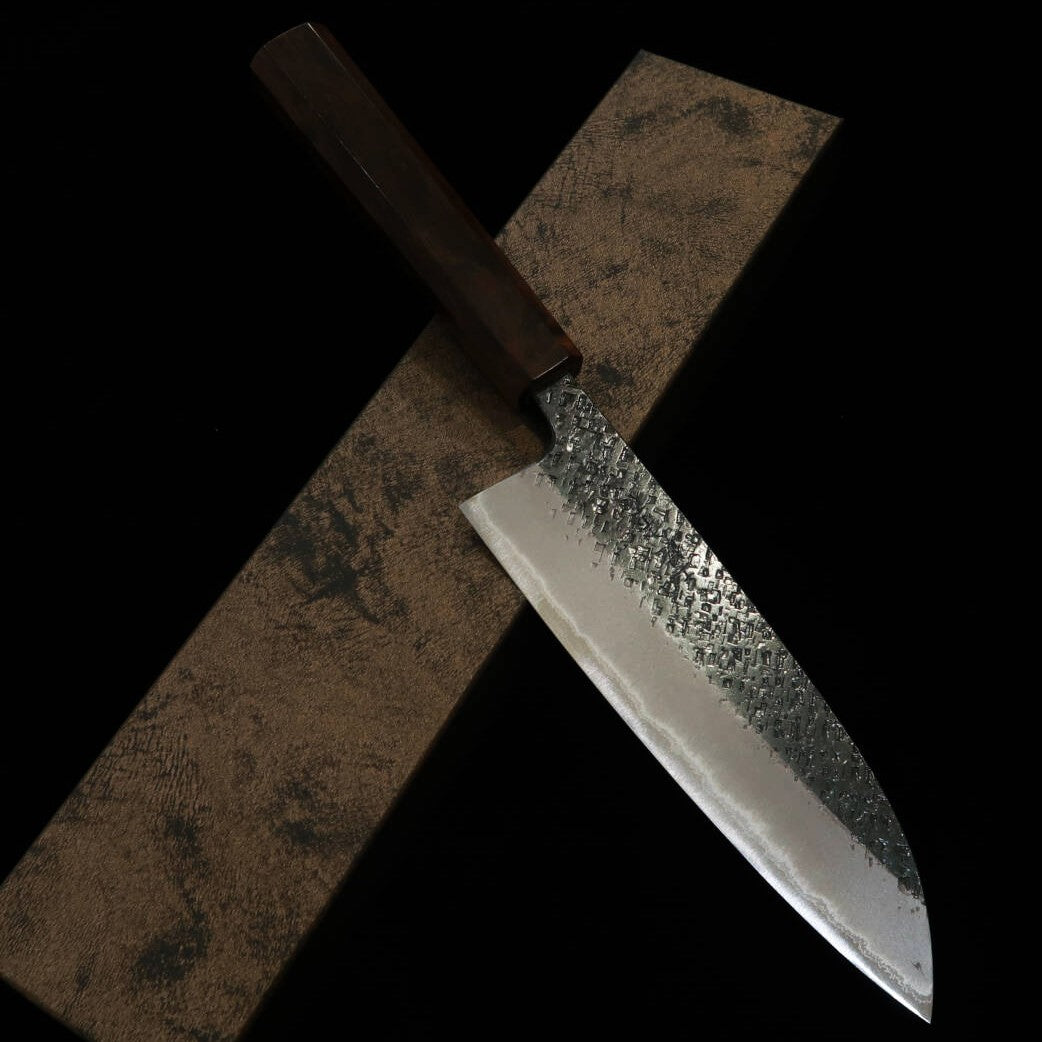 TOSAMUNEISHI Santoku Aogami nº 2 martillado acabado negro mango octogonal de ébano (165 mm)