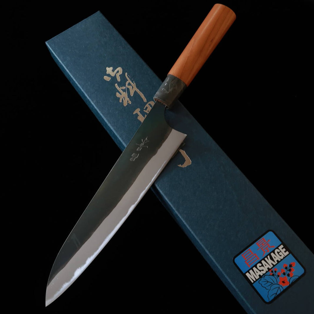 Santoku MASAKAGE Agua, Aogami no.2, acabado kurouchi, mango de cerezo americano (210 mm)