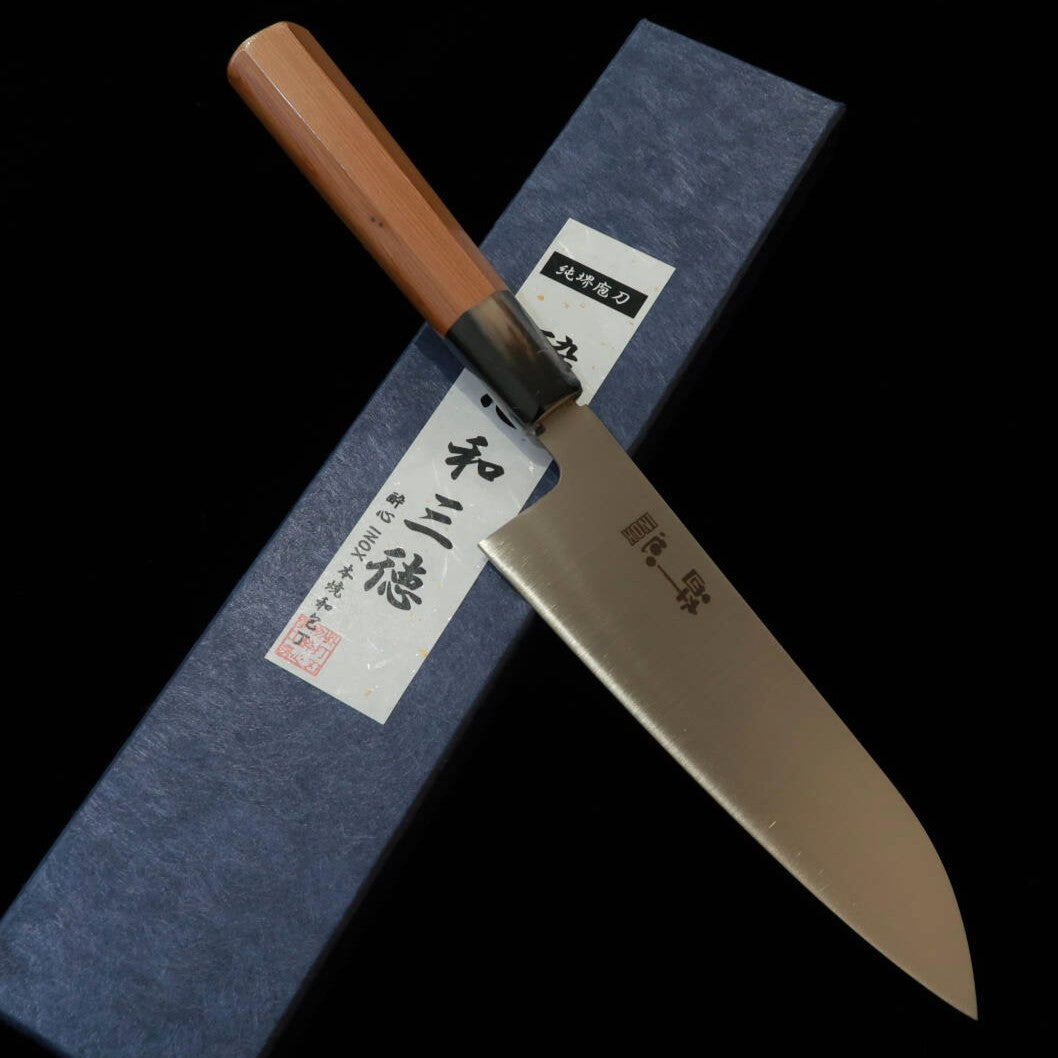 Suisin SUISIN Santoku INOX Honyaki, cabo semirredondo hexagonal em madeira Ichii (180 mm)