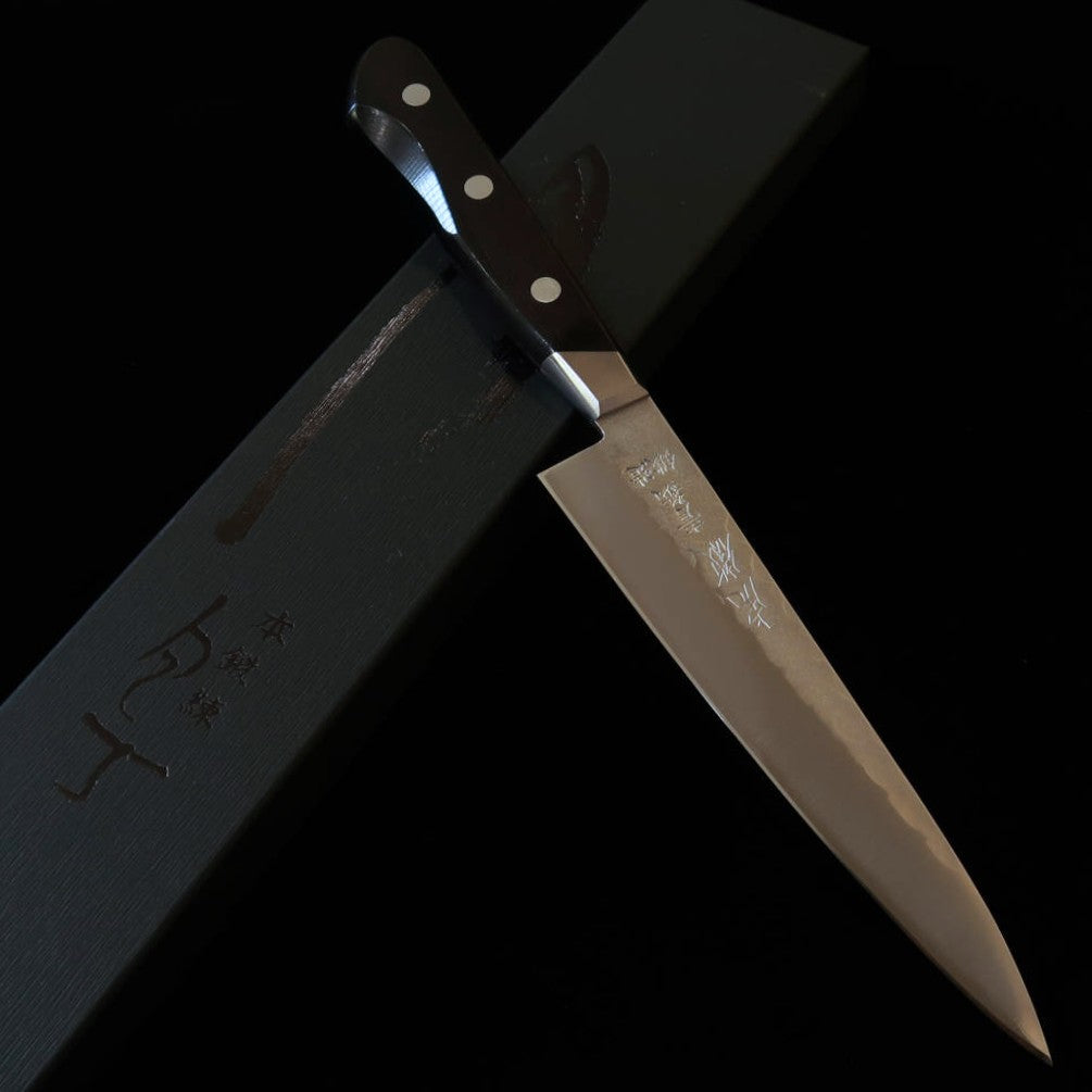 Minamoto Kotetsu Petty Yasugi Aogami nº2 acabado Nashiji con guarda mango laminado negro (135 mm)