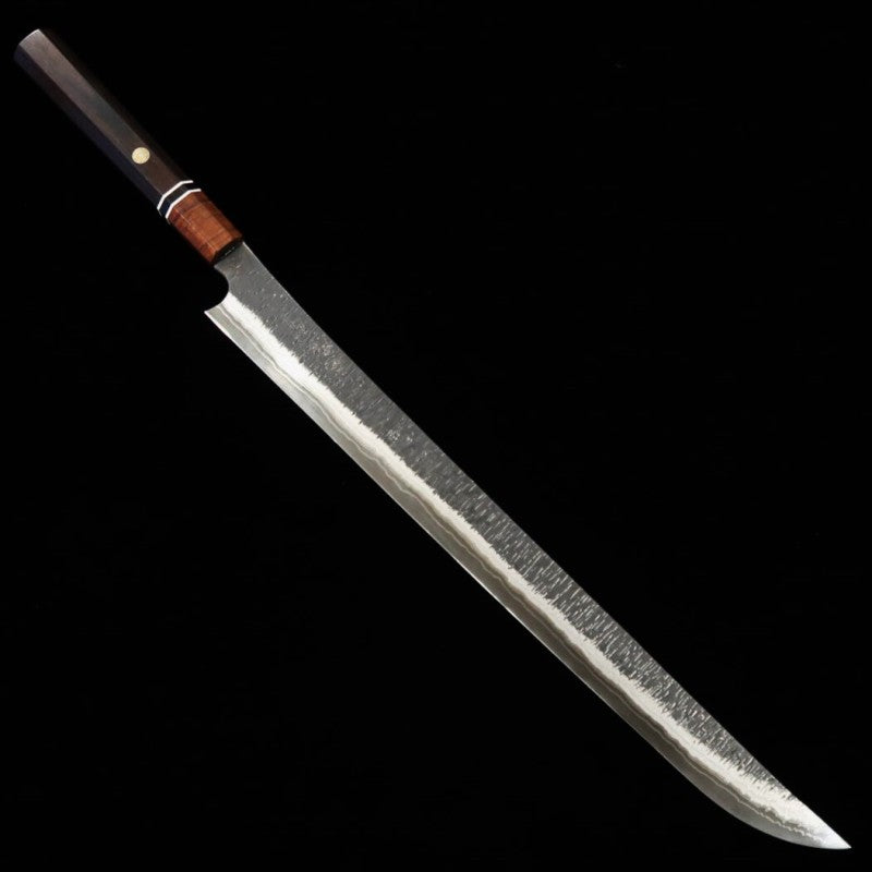 NIGARA Nitō Hamono Forging  Sujihiki de punta redondeada kuro-uchi martillado damasco mango octogonal de ébano (450 mm)