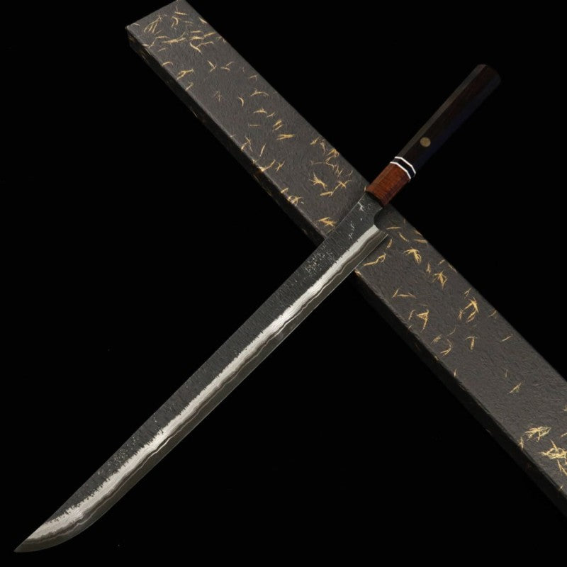 NIGARA Nitō Hamono Forging  Sujihiki de punta redondeada kuro-uchi martillado damasco mango octogonal de ébano (450 mm)