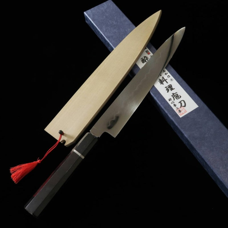 Suisin SUISIN Mizumoto Yaki, fabriqué par Miwa Ikeda, Wa-Sujihiki, acier Shirogami n°1, manche en ébène avec virole argentée, fourreau en magnolia inclus (240 mm)