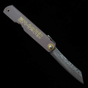 Nagao Kanekoma HIGONOKAMI Higonokami VG10 finition martelée, manche en cuir gris (72mm)
